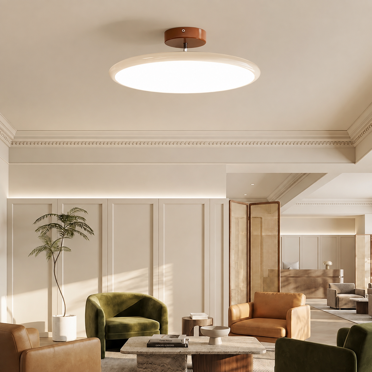 A modern flush-mount ceiling light with a circular white diffuser and a warm brown wood accent ring, installed in a minimalist, warm-toned contemporary living room.